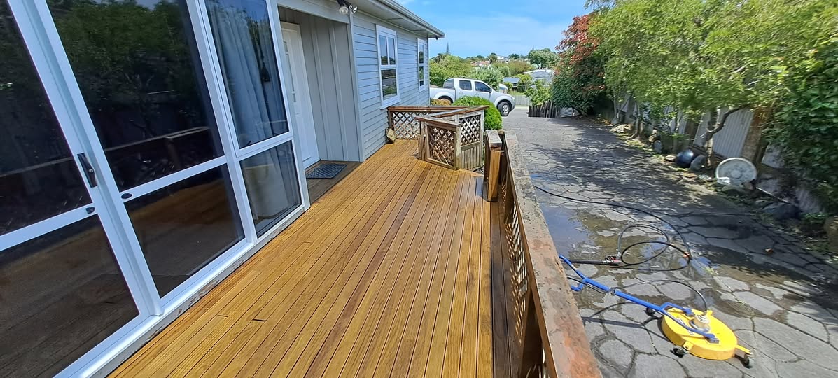 Deck with pressure washer